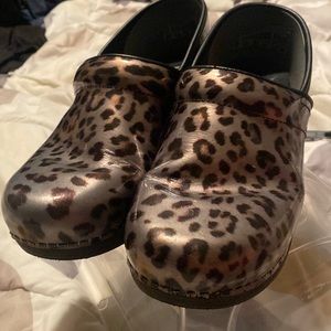 Dansko XP 2.0 animal print clogs.